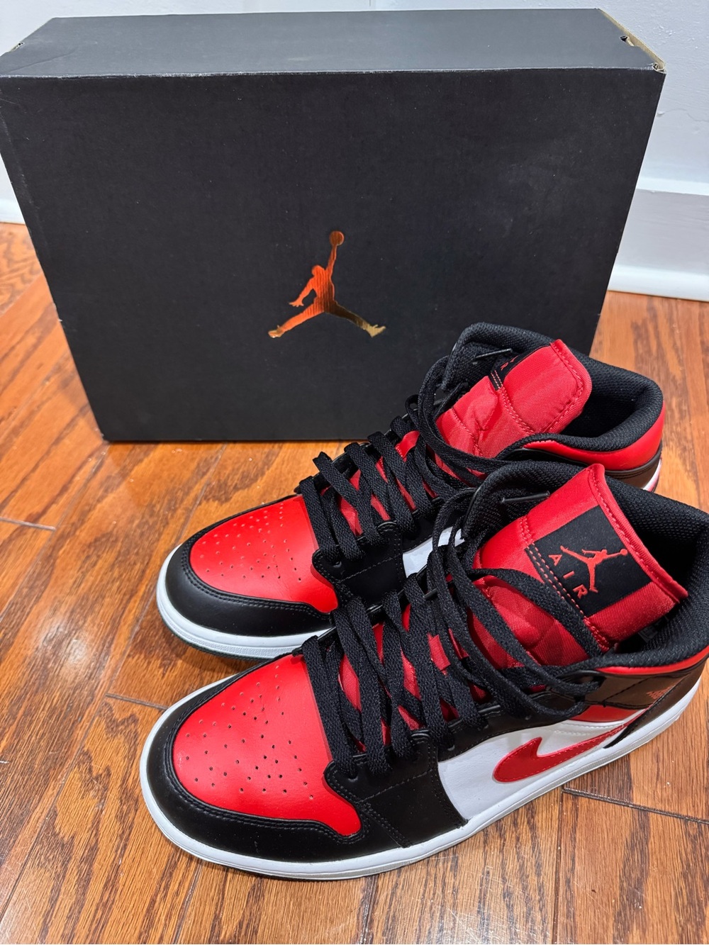 Jordan Men’s Mid-Top Sneakers in Red, Black, White